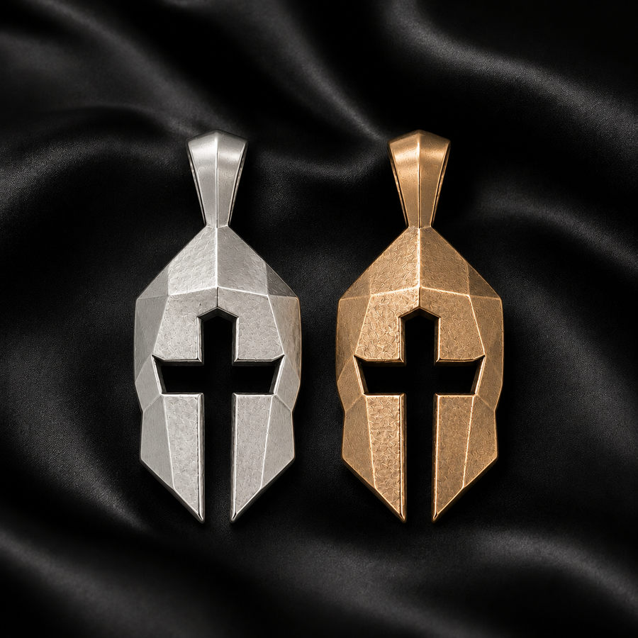 Silver and bronze Cross & Helm pendants on black satin, warrior helm with cross cutout