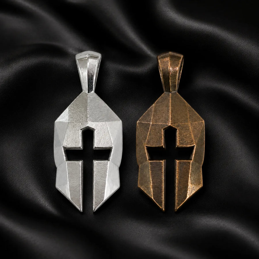 Two Cross & Helm Founder's Edition pendants: one silver sterling, one bronze, on black satin.