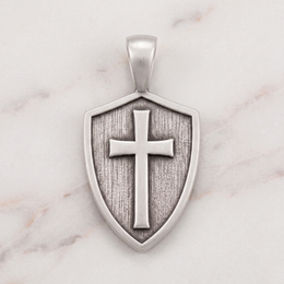 Women's Cross & Shield pendant in silver on white marble