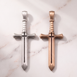 Women's Cross & Sword pendants in silver and bronze on white marble
