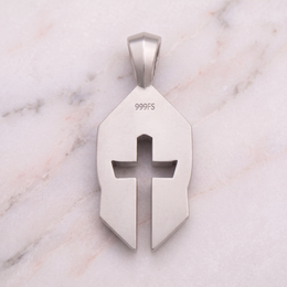 Back of the silver Women's Cross & Helm, stamped 999FS, on white marble
