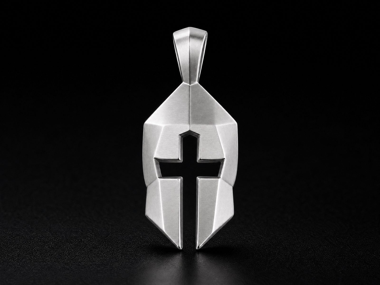 Bronze Cross and Helm pendant on dark fabric