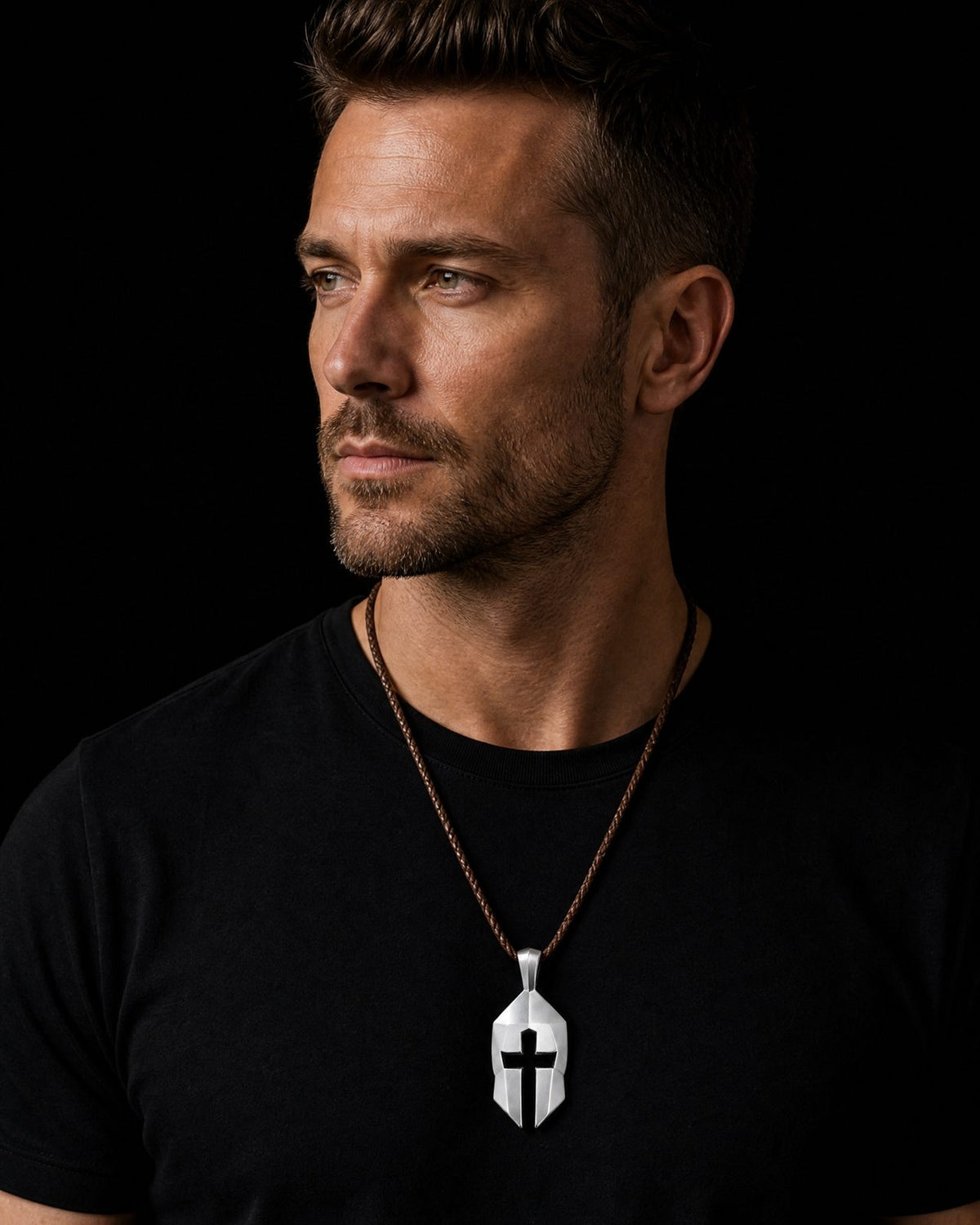 Cross & Helm pendant worn at a realistic 40 mm daily scale in a refined low-light setting